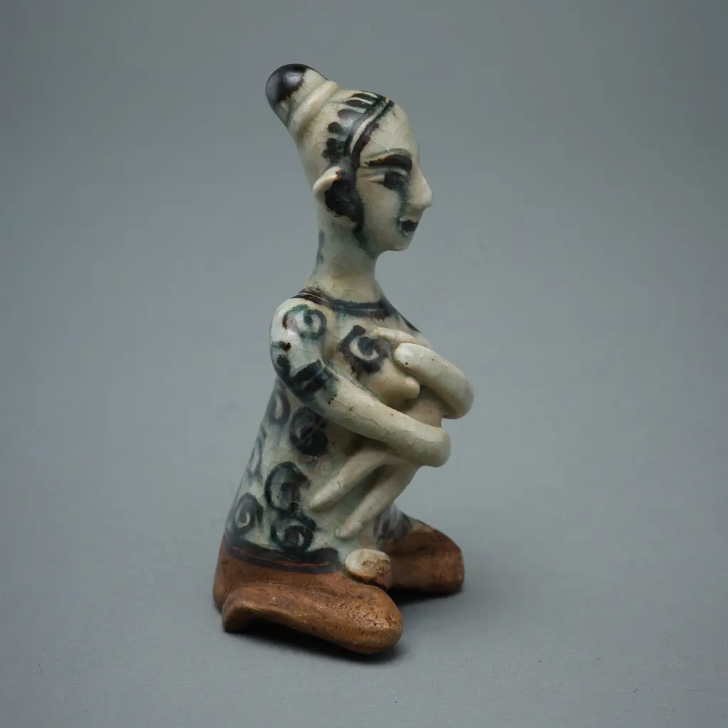 A Sawankhalok stoneware figure (tukatha), Image 1++
